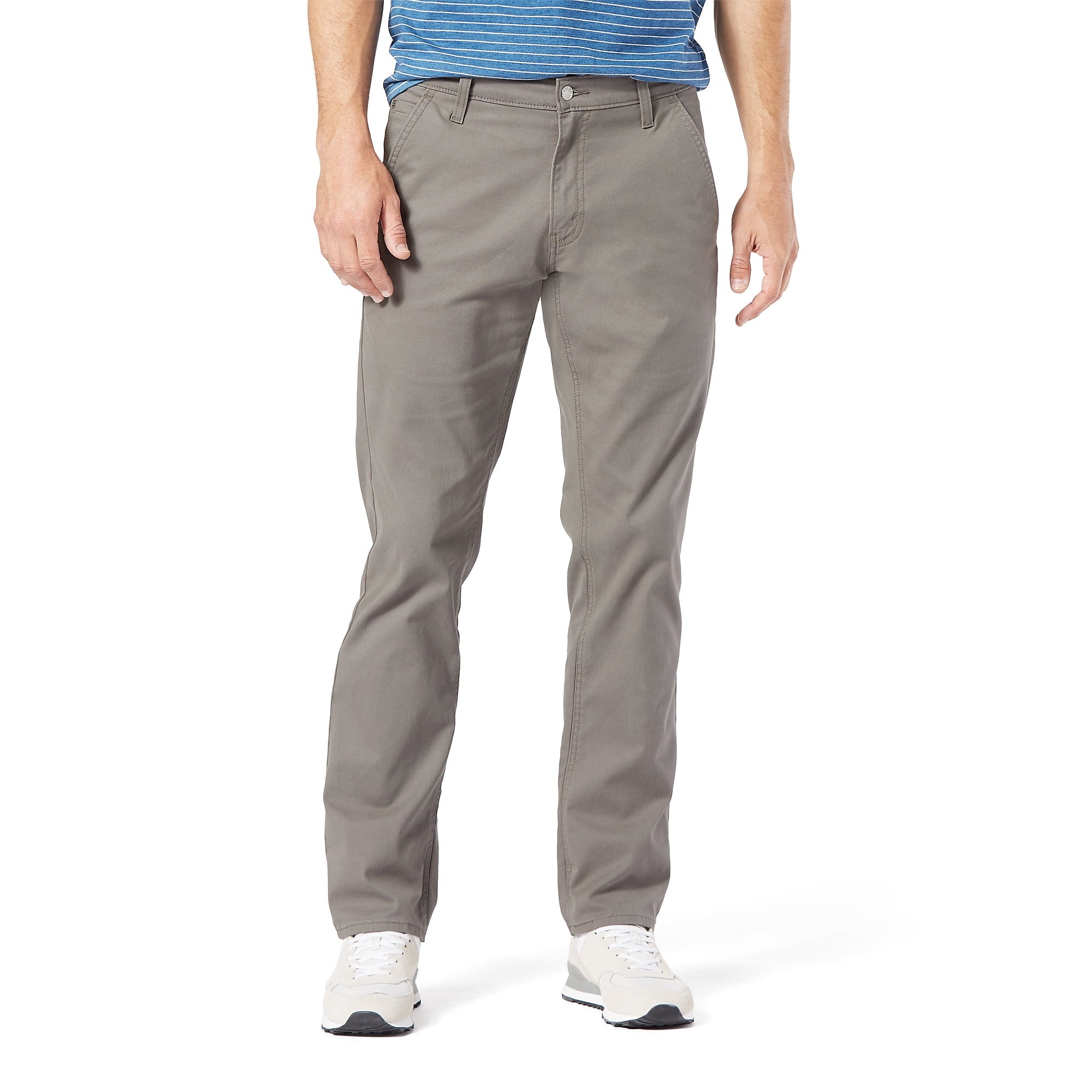 Person wearing gray Levi S67 Hybrid Chinos pants on a white background